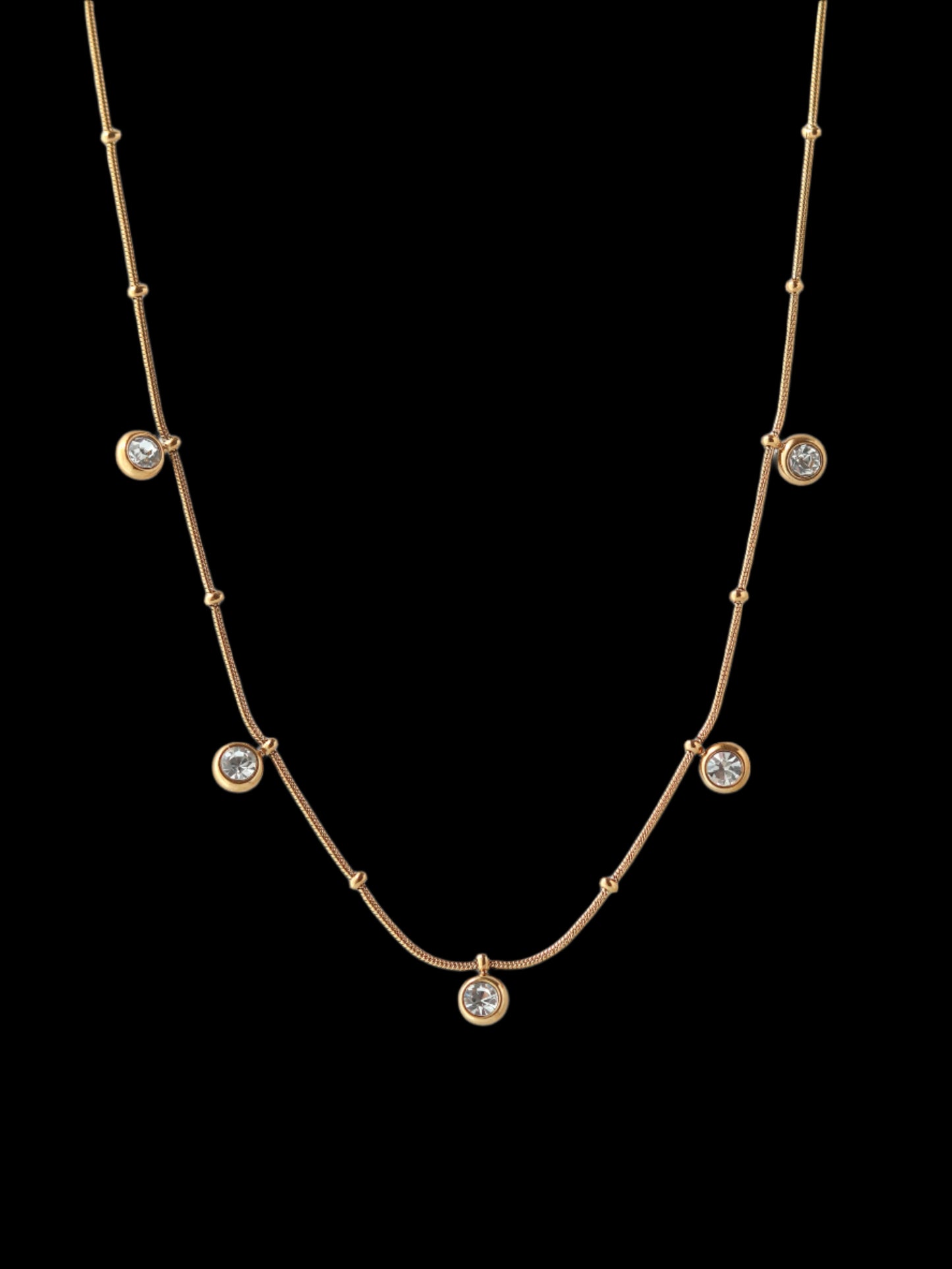 Gold necklace with small gemstones