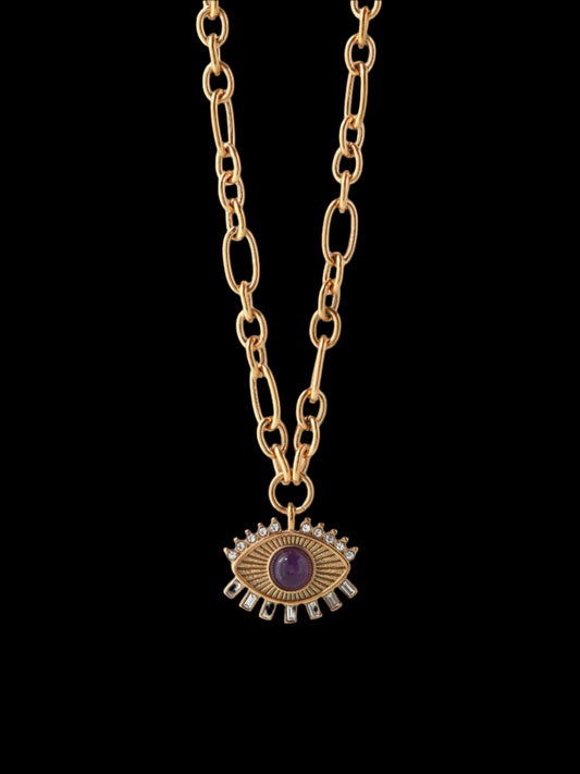 Gold necklace with an eye-shaped pendant