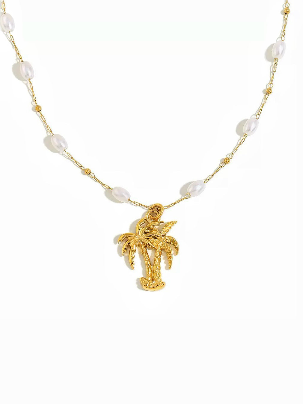 A gold chain necklace featuring irregular white pearl-like beads and a small gold palm tree pendant, displayed on a clean white background.