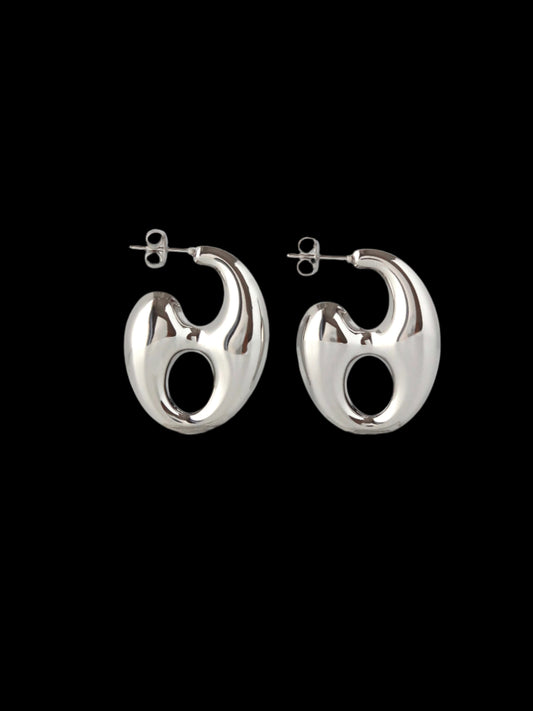 Pair of silver hoop earrings on a white background