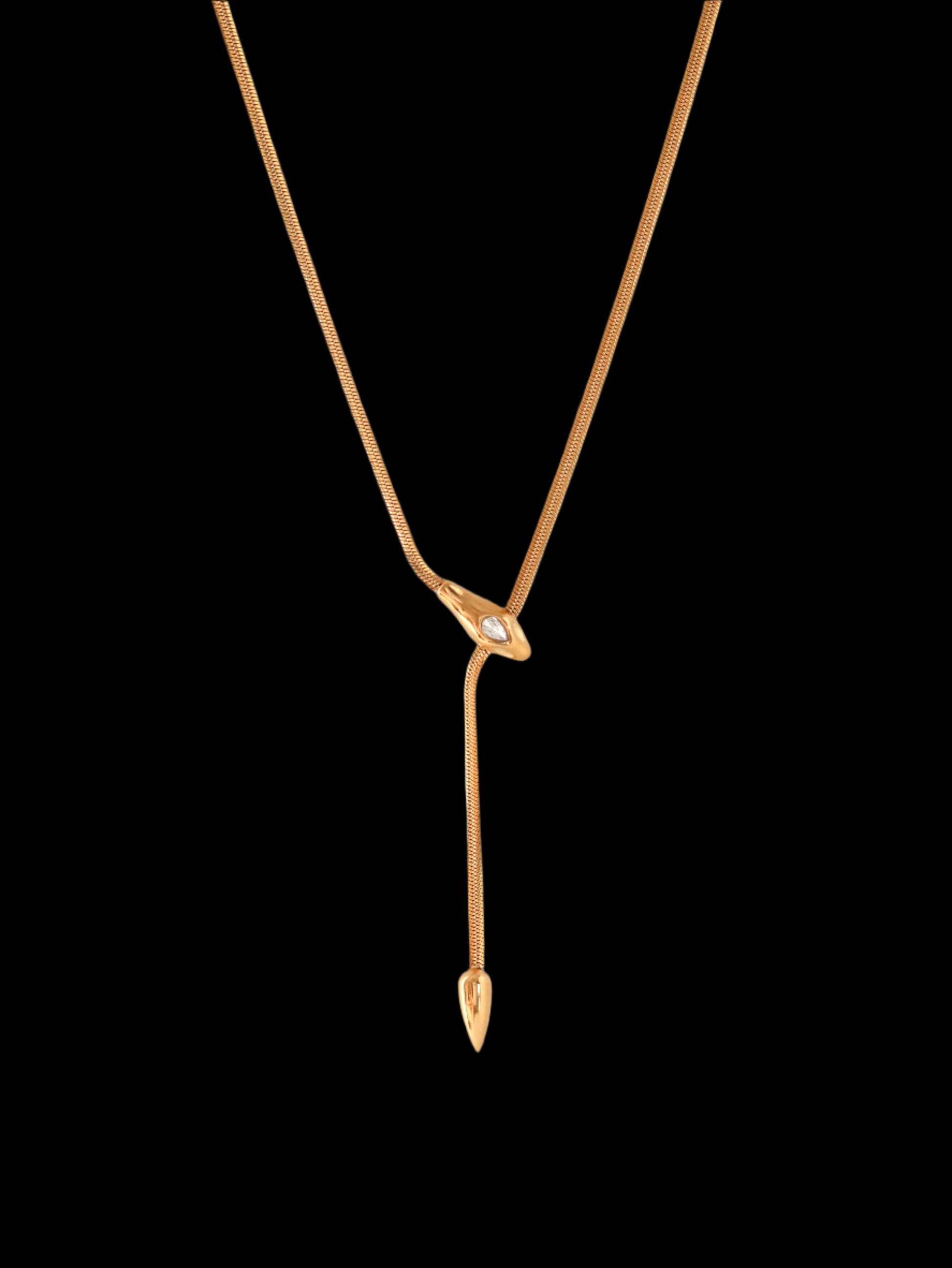 Gold necklace with a unique pendant on a white background