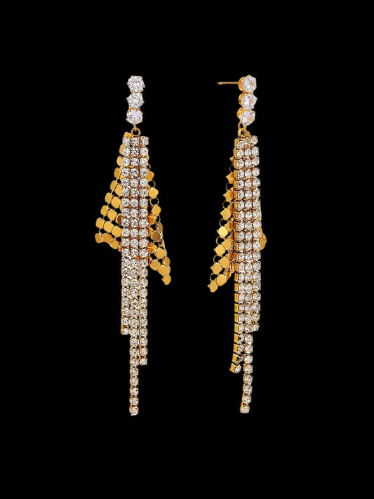Pair of gold and crystal earrings on a white background